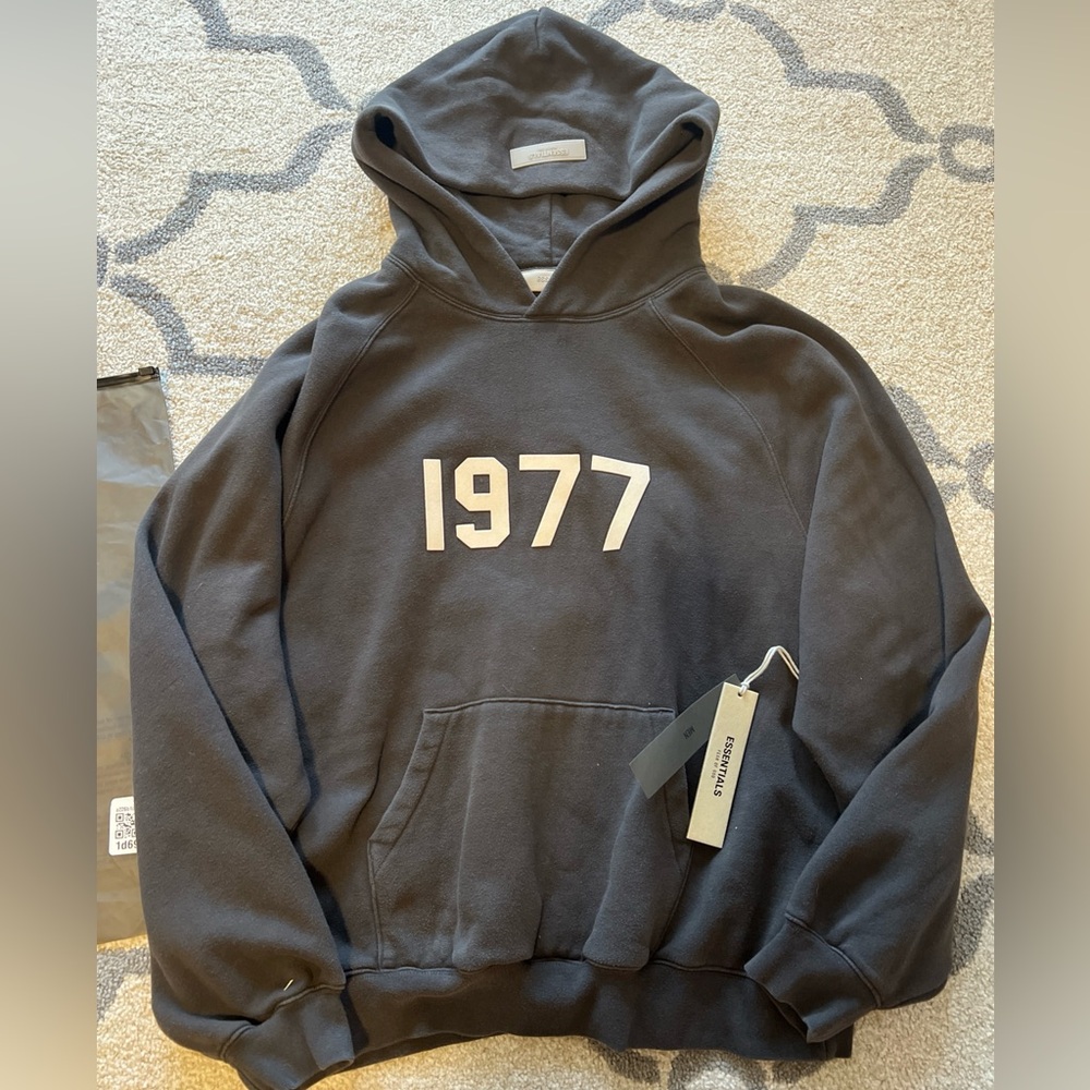 1977 ESSENTIALS: Color: IRON: Size small Hoodie. Good Used Condition. Authentic.